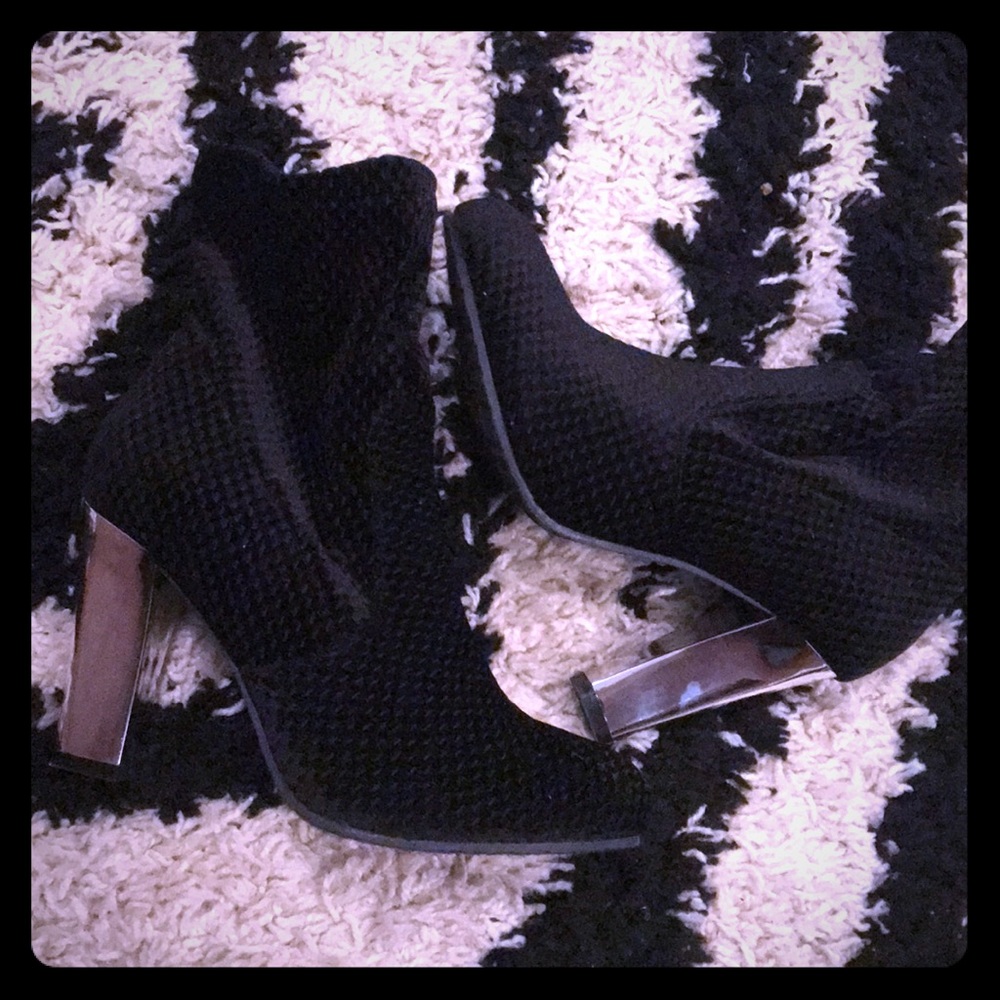 Black sliver heel booties